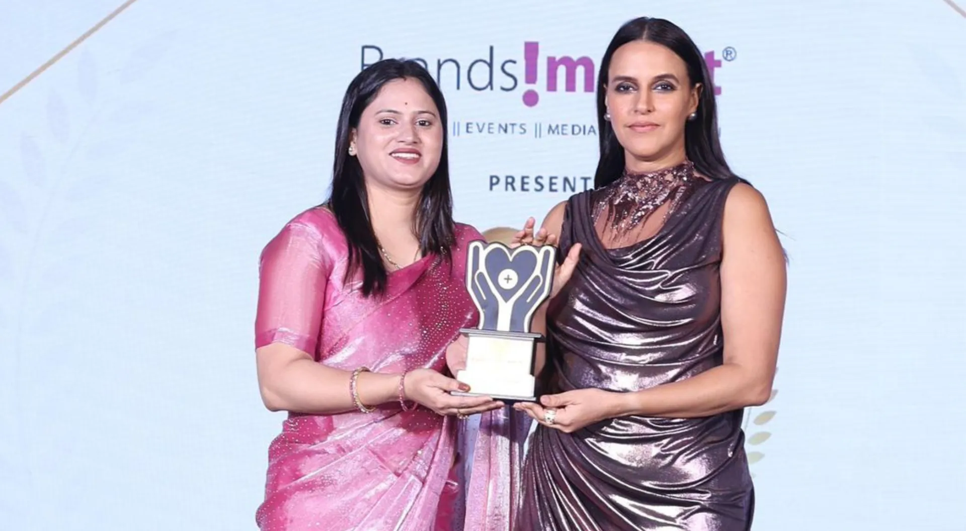 Awards Taken by Neha Dhupia at Brands impact.